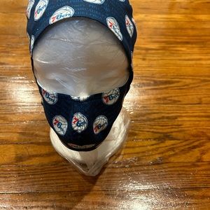 Surgical cap with matching mask.